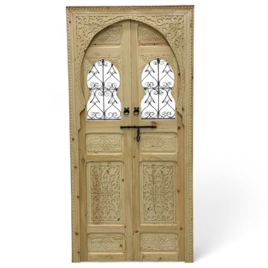 Decorative Marrakech door with intricate patterns and vibrant colors, showcasing traditional Moroccan design elements.