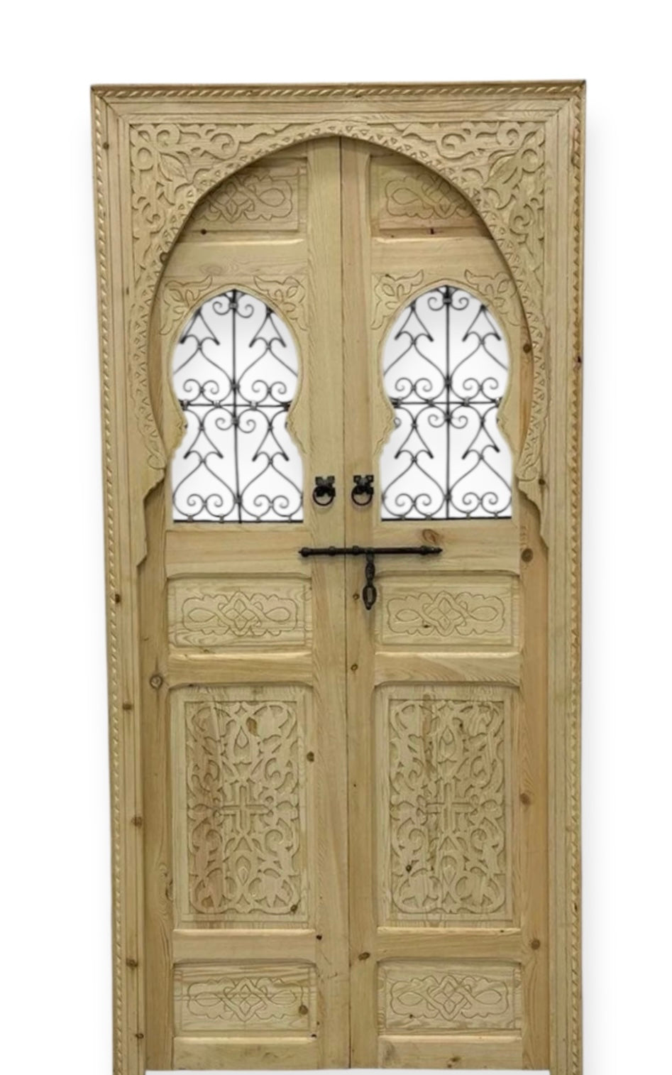 Decorative Marrakech wooden door with intricate carvings and vibrant patterns, showcasing traditional Moroccan craftsmanship.