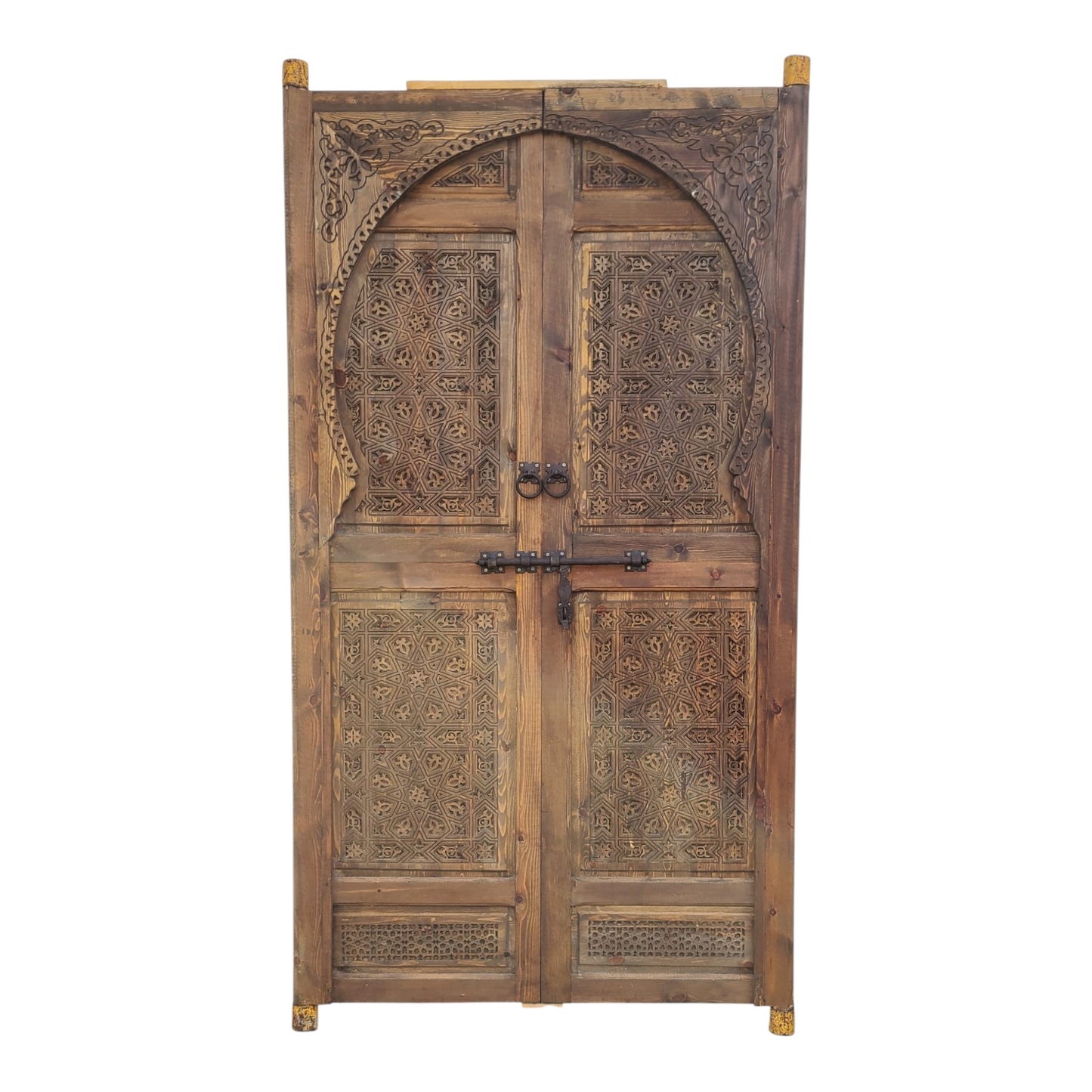Moroccan Alcazar palace door with intricate patterns and vibrant colors, showcasing traditional Moroccan craftsmanship.